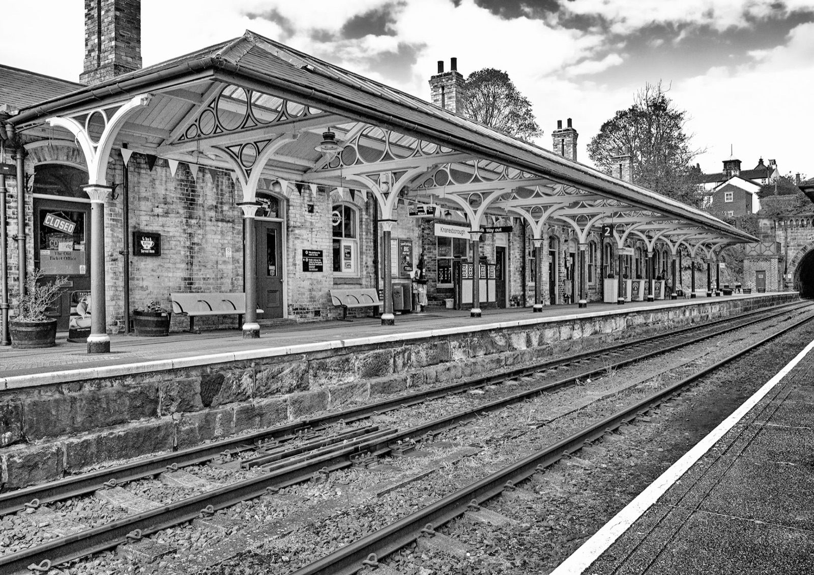 Empty platform and ornate canopy ironwork — Knaresborough railway station