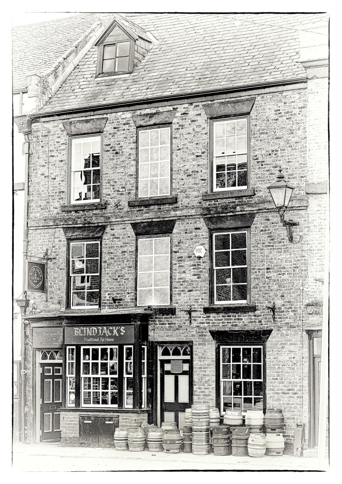 Period shopfront with barrels stacked outside — Knaresborough old town character