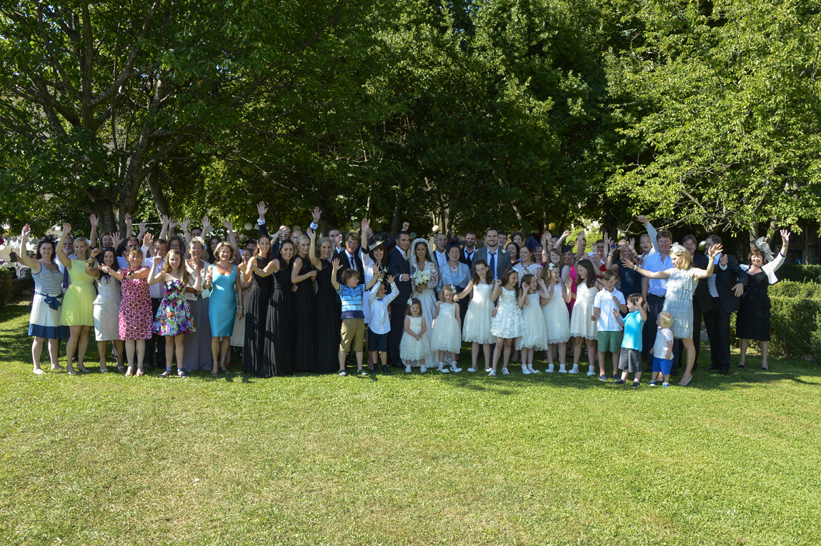 04 — the wedding party · arms raised