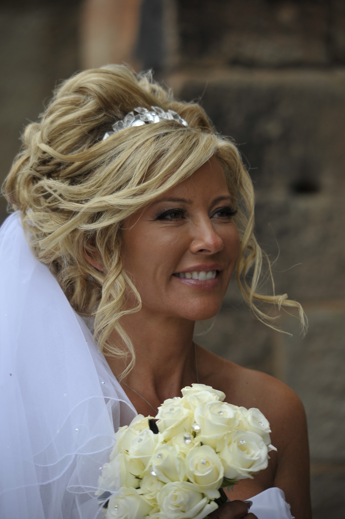 Bridal portrait — with the bouquet, church steps