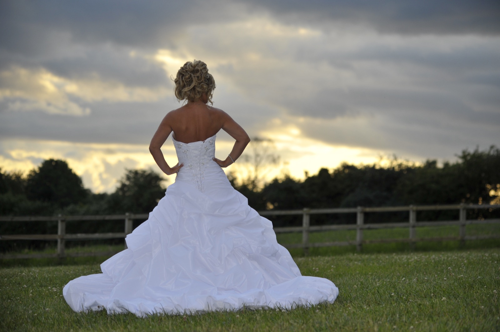 Bridal portrait — the dress against an evening sky